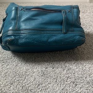 The Sak shoulder bag. This is robins egg blue. So cute!!! Gently used.